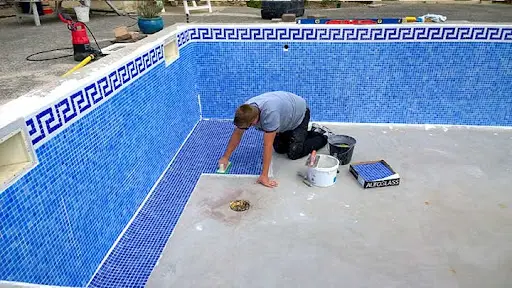 Tiling A Swimming Pool In Mosaic Tiles